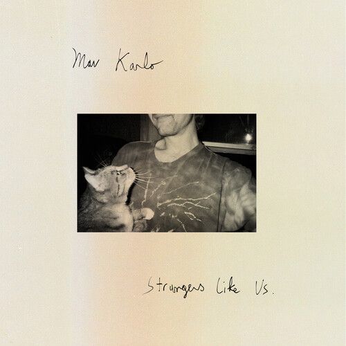 Strangers Like Us cover art