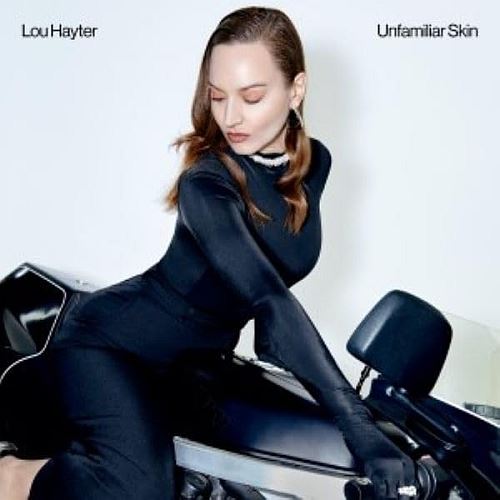 Unfamiliar Skin cover art